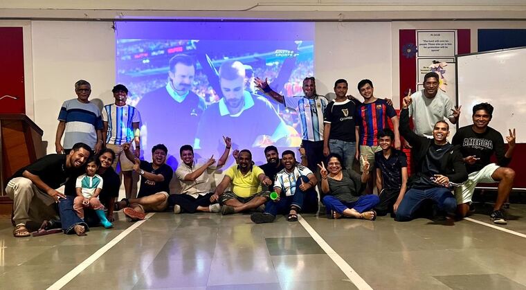 Parishioners at the FIFA World Cup Final watch party